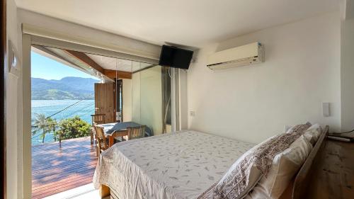 Ágy, Chale Jabuticabeira com Wi-Fi e vista para o mar in Praia do Portinho Ágy, Chale Jabuticabeira com Wi-Fi e vista para o mar in Praia do Portinho