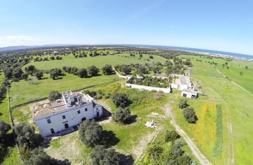 Фасада на хотела, Masseria Palombara Grande in Остуни Фасада на хотела, Masseria Palombara Grande in Остуни