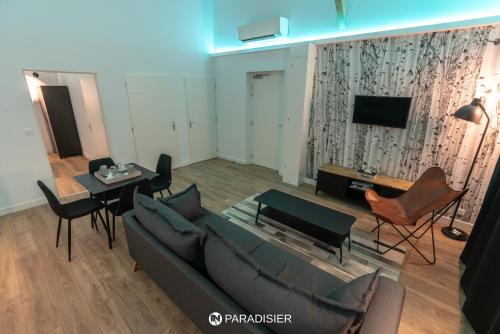 Közös társalgó / TV, Paradisier in Villars-les-Dombes Közös társalgó / TV, Paradisier in Villars-les-Dombes