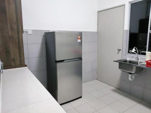 Kitchen, IJM Suria Apartment near Sepilok Forest Reserve Kitchen, IJM Suria Apartment near Sepilok Forest Reserve