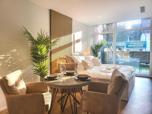 Bed, SiOUX stilvolle Designapartments am Stadttor in Ravensburg Bed, SiOUX stilvolle Designapartments am Stadttor in Ravensburg