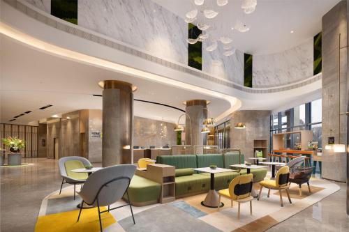 Közös társalgó / TV, Home2 Suite by Hilton Ningbo Yinzhou in Yinzhou Wanda Tér Közös társalgó / TV, Home2 Suite by Hilton Ningbo Yinzhou in Yinzhou Wanda Tér