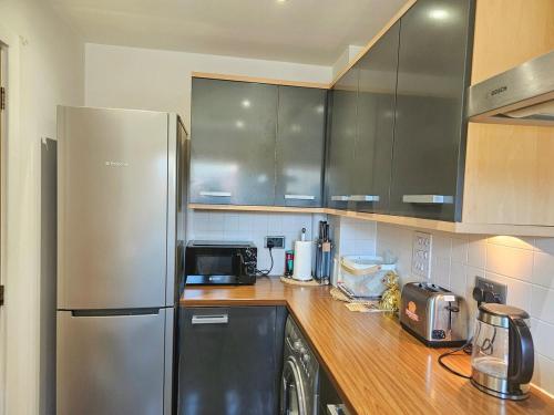Cocina, Cozy Home Away from Home with London & Gatwick Airport Nearby in Reigate Cocina, Cozy Home Away from Home with London & Gatwick Airport Nearby in Reigate