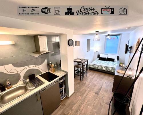Bed, Montbel'Appart - Studio tout equipe Hyper Centre in Montbeliard Bed, Montbel'Appart - Studio tout equipe Hyper Centre in Montbeliard