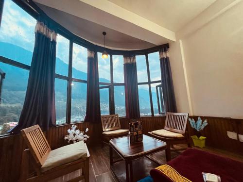 Hotel New Hadimba Palace Inn - Mountain View with Premium Rooms Near Mall Road , Manali in Siyal Hotel New Hadimba Palace Inn - Mountain View with Premium Rooms Near Mall Road , Manali in Siyal