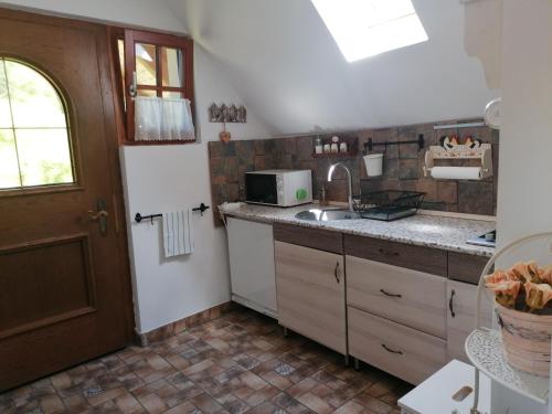 ห้องครัว, NATURKERT Vendégház (NATURKERT Vendeghaz) in เลเซนเชโตไม ห้องครัว, NATURKERT Vendégház (NATURKERT Vendeghaz) in เลเซนเชโตไม