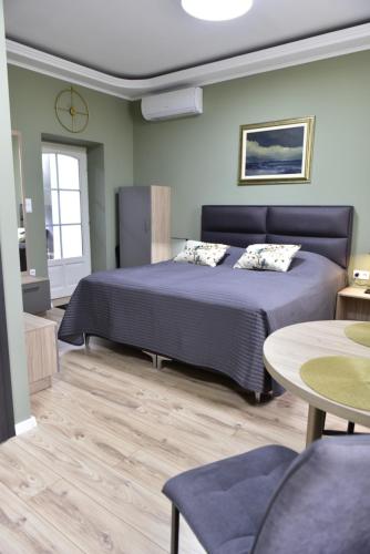 Ágy, Tornácos Vendégház Kőröshegy (Tornacos Vendeghaz Koroshegy) in Kőröshegy Ágy, Tornácos Vendégház Kőröshegy (Tornacos Vendeghaz Koroshegy) in Kőröshegy