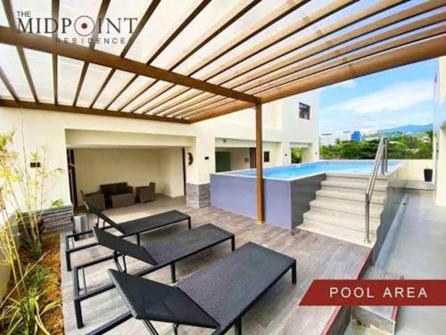 Midpoint Residences Netflix with Free Pool Access