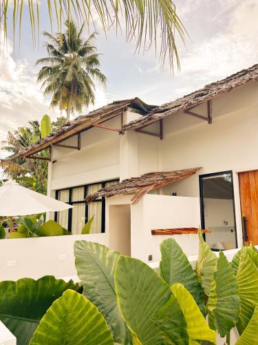Casa de 60 m2 amb 1 habitació i 1 bany privat a Botohilitano (OLITAS HOUSE NIAS ) in Botohilitano Casa de 60 m2 amb 1 habitació i 1 bany privat a Botohilitano (OLITAS HOUSE NIAS ) in Botohilitano