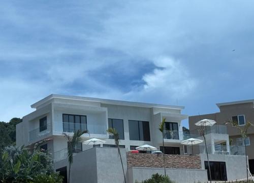 Vue extérieure, White Sky Beach Villas in Whitehouse Vue extérieure, White Sky Beach Villas in Whitehouse