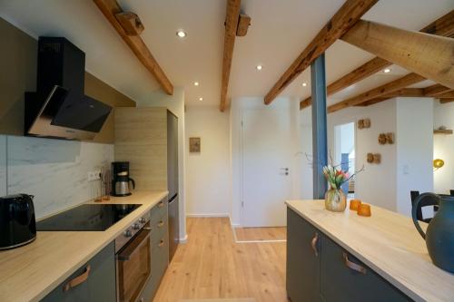 廚房, Raabennest - Bewusst Genießen Junges Wohnen im Alten Dorf in 尤貝克 廚房, Raabennest - Bewusst Genießen Junges Wohnen im Alten Dorf in 尤貝克