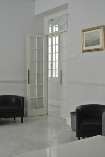 Shared lounge/TV area, Pension Santa Paula in Málaga Shared lounge/TV area, Pension Santa Paula in Málaga