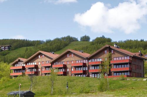 Buitenkant, Central and handicap friendly 3 bedroom apartment in Beitostolen Buitenkant, Central and handicap friendly 3 bedroom apartment in Beitostolen