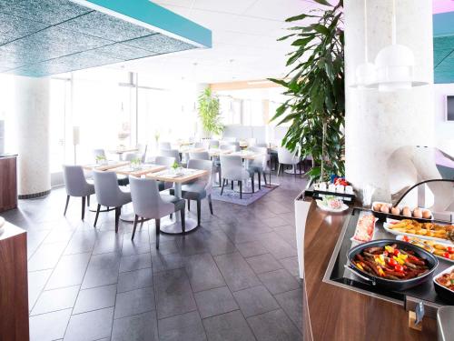 Étterem, Novotel Suites Hannover City in Hannover Étterem, Novotel Suites Hannover City in Hannover