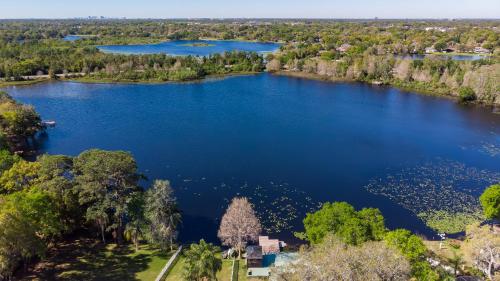 Lakefront Retreat - Boat - Fish - Close to all Orlando Parks - Disney - Universal - SeaWorld in Орландо-Ист Lakefront Retreat - Boat - Fish - Close to all Orlando Parks - Disney - Universal - SeaWorld in Орландо-Ист