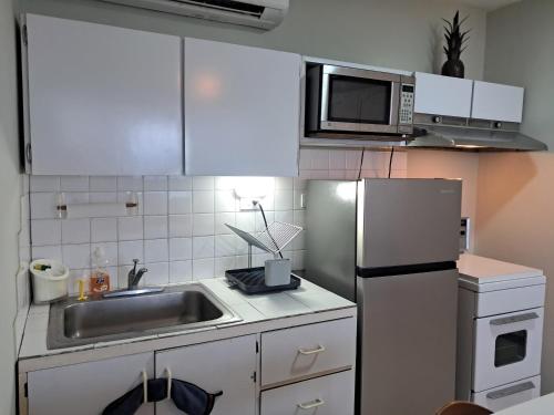 Kitchen, Apartamento Vacacional Playa Grande in Maiquetía Kitchen, Apartamento Vacacional Playa Grande in Maiquetía