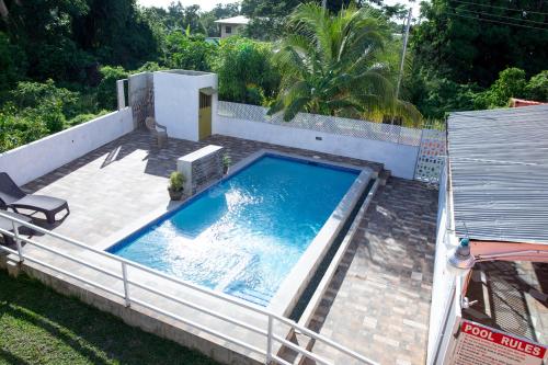 สระว่ายน้ำ, Lesville Tobago in บุคกู สระว่ายน้ำ, Lesville Tobago in บุคกู