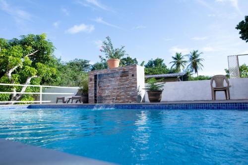 สระว่ายน้ำ, Lesville Tobago in บุคกู สระว่ายน้ำ, Lesville Tobago in บุคกู