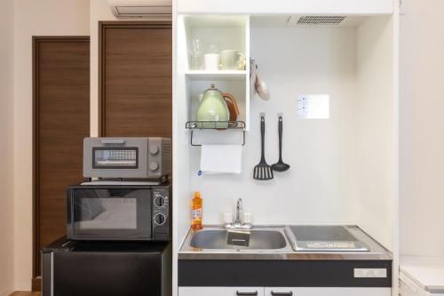 Kitchen, Ocean 西九条 near Nishi Kujo Train Station Kitchen, Ocean 西九条 near Nishi Kujo Train Station