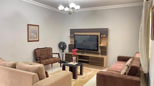 Shared lounge/TV area, Casa de Temporada em Caldas Novas in Jardim Roma Shared lounge/TV area, Casa de Temporada em Caldas Novas in Jardim Roma