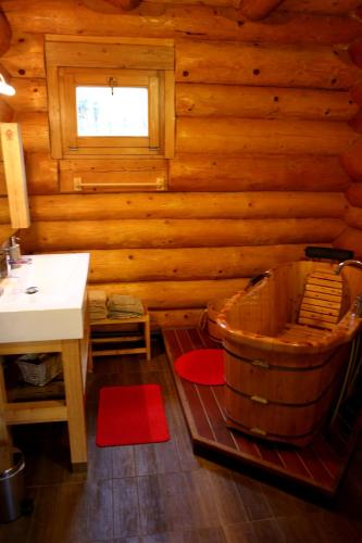 Bathroom, Gite En Rondins in Janvry Bathroom, Gite En Rondins in Janvry