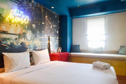 Exquisite 1BR Apartment at Puri Mas By Travelio