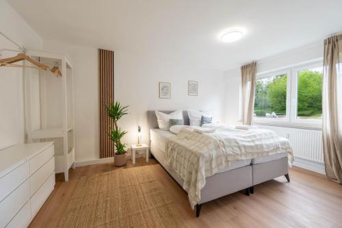 睡床, BackHome - BUSINESS&FAMILY - TOP LAGE, Parkplatz, Balkon, Waschmaschine, Netflix, 90qm, 24h Checkin in 巴克南 睡床, BackHome - BUSINESS&FAMILY - TOP LAGE, Parkplatz, Balkon, Waschmaschine, Netflix, 90qm, 24h Checkin in 巴克南