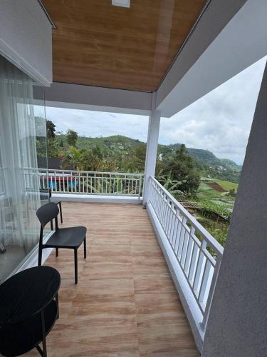 Balcony/terrace, SunSet Lawu Kemuning, Villa, Full House 3 Bed, Free BBQ, Free Float Light Breakfast near Cetho Temple Balcony/terrace, SunSet Lawu Kemuning, Villa, Full House 3 Bed, Free BBQ, Free Float Light Breakfast near Cetho Temple