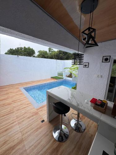 Swimming pool, SunSet Lawu Kemuning, Villa, Full House 3 Bed, Free BBQ, Free Float Light Breakfast near Cetho Temple Swimming pool, SunSet Lawu Kemuning, Villa, Full House 3 Bed, Free BBQ, Free Float Light Breakfast near Cetho Temple