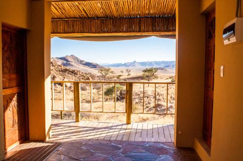 Навколишнє середовище, Barkhan Dune Retreat in Solitaire Навколишнє середовище, Barkhan Dune Retreat in Solitaire