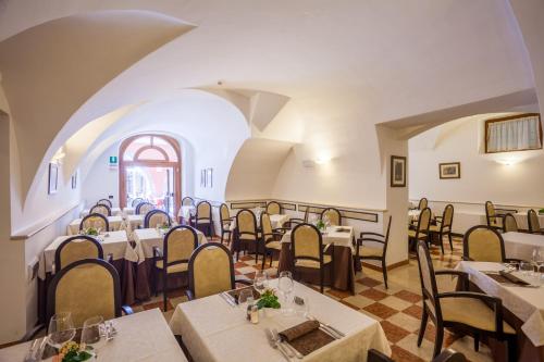 مطعم, Hotel Portici - Romantik & Wellness in وسط مدينة ريفا ديل جاردا مطعم, Hotel Portici - Romantik & Wellness in وسط مدينة ريفا ديل جاردا