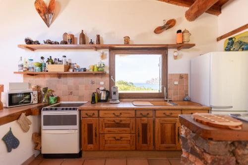 Konyha, La Maison de Mammò (La Maison de Mammo) in Partinello Konyha, La Maison de Mammò (La Maison de Mammo) in Partinello