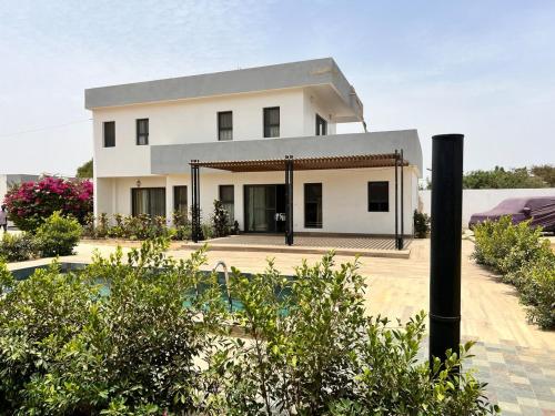 Villa Cosy NGuérigne Sénégal (Villa Cosy NGuerigne Senegal) in 辛蒂亞 Villa Cosy NGuérigne Sénégal (Villa Cosy NGuerigne Senegal) in 辛蒂亞