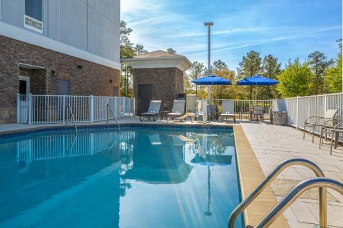 Úszómedence, Holiday Inn Express & Suites Aiken By IHG in Aiken (Dél-Karolina) Úszómedence, Holiday Inn Express & Suites Aiken By IHG in Aiken (Dél-Karolina)