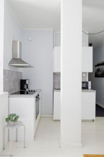 Kitchen, Stylish and renovated apartment in Punavuori in Eira Kitchen, Stylish and renovated apartment in Punavuori in Eira