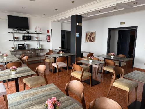 gedeelde lounge/tv-ruimte, Hotel Praderon in San Sebastian de los Reyes gedeelde lounge/tv-ruimte, Hotel Praderon in San Sebastian de los Reyes