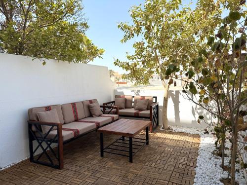 Balcony/terrace, DIOM Luxe Hostel - Next to AUH & Yas Island near Aldar HQ Building Balcony/terrace, DIOM Luxe Hostel - Next to AUH & Yas Island near Aldar HQ Building