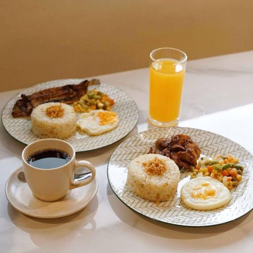 طعام و مشروبات, Snooze Inn & Suites in ماتينا أبلايا طعام و مشروبات, Snooze Inn & Suites in ماتينا أبلايا