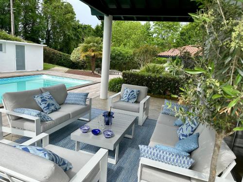 Úszómedence, Villa à 5min de Bayonne avec Piscine chauffé et salle de sport (Villa a 5min de Bayonne avec Piscine chauffe et salle de sport) in Saint Pierre D'Irube Úszómedence, Villa à 5min de Bayonne avec Piscine chauffé et salle de sport (Villa a 5min de Bayonne avec Piscine chauffe et salle de sport) in Saint Pierre D'Irube