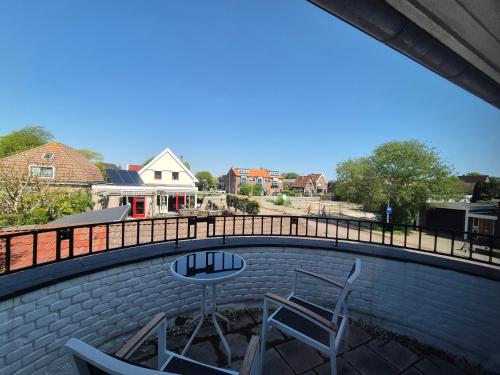 Balcony/terrace, Hotel Den Burg in Texel Balcony/terrace, Hotel Den Burg in Texel