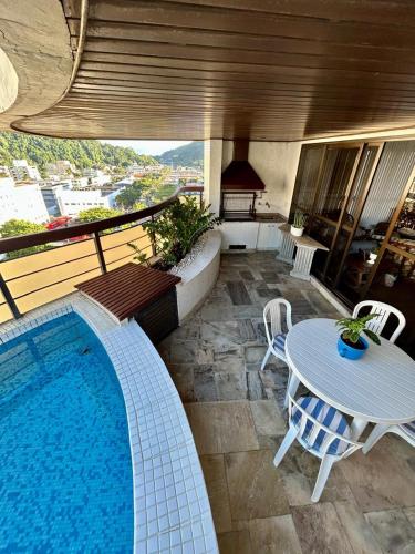 游泳池, Apartamento Luxo Guarujá completo com piscina e churrasqueira na varanda (Apartamento Luxo Guaruja completo com piscina e churrasqueira na varanda) in 皮坦蓋拉斯 游泳池, Apartamento Luxo Guarujá completo com piscina e churrasqueira na varanda (Apartamento Luxo Guaruja completo com piscina e churrasqueira na varanda) in 皮坦蓋拉斯