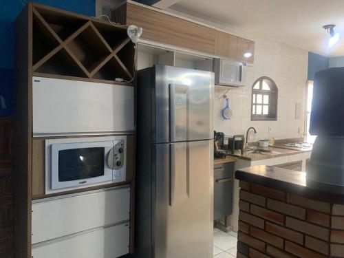 ห้องครัว, Casa ampla a 100 passos do mar, piscina, churrasqueira, salão de jogos (Casa ampla a 100 passos do mar, piscina, churrasqueira, salao de jogos) in บาร์ราโนวา ห้องครัว, Casa ampla a 100 passos do mar, piscina, churrasqueira, salão de jogos (Casa ampla a 100 passos do mar, piscina, churrasqueira, salao de jogos) in บาร์ราโนวา