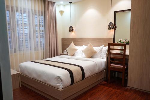 客室内ベッド, Budhanilkantha Homestay in ブダニールカンタ 客室内ベッド, Budhanilkantha Homestay in ブダニールカンタ