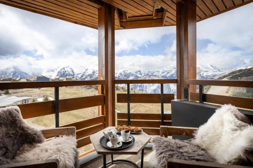 Erkély/terasz, Hotel Royal Ours Blanc in L'Alpe d'Huez Erkély/terasz, Hotel Royal Ours Blanc in L'Alpe d'Huez