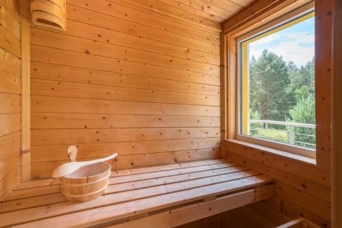 Sauna, Ferienpark Rubezahl am Muggelsee, Haus 13 Erle mit eigener Sauna, idealer Ort fur Natur- und Erholun in Kopenick Sauna, Ferienpark Rubezahl am Muggelsee, Haus 13 Erle mit eigener Sauna, idealer Ort fur Natur- und Erholun in Kopenick