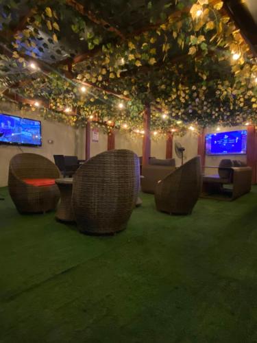 Shared lounge/TV area, Emmaag Hotel, Ibadan in Ibadan Shared lounge/TV area, Emmaag Hotel, Ibadan in Ibadan