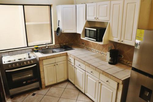 Cocina, Nesthost Stay Hotel in Managua Cocina, Nesthost Stay Hotel in Managua