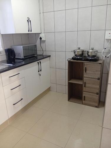 متر مربع من 1 غرفة و1 حمام خاص في Amiel Park (Visitors' Paradise Guest House) in Amiel Park متر مربع من 1 غرفة و1 حمام خاص في Amiel Park (Visitors' Paradise Guest House) in Amiel Park