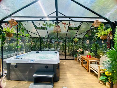 Bañera de hidromasaje, Morning Glory, Huisje vogelzang in Beekbergen Bañera de hidromasaje, Morning Glory, Huisje vogelzang in Beekbergen