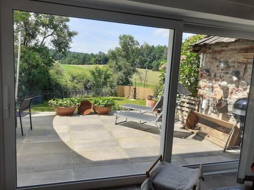 Terraza/balcón, Apartment am Vierkanthof im Thermenland in Bad Blumau Terraza/balcón, Apartment am Vierkanthof im Thermenland in Bad Blumau